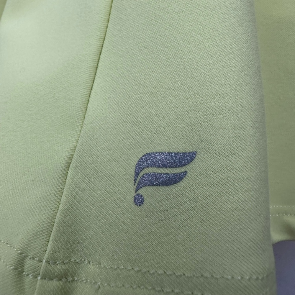 NWT Fabletics Flounce Skirt - LG - Lemon Crème skirt w/built-in shorts & pockets - Picture 2 of 16
